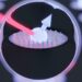 Electron Spin in a Quantum Dot